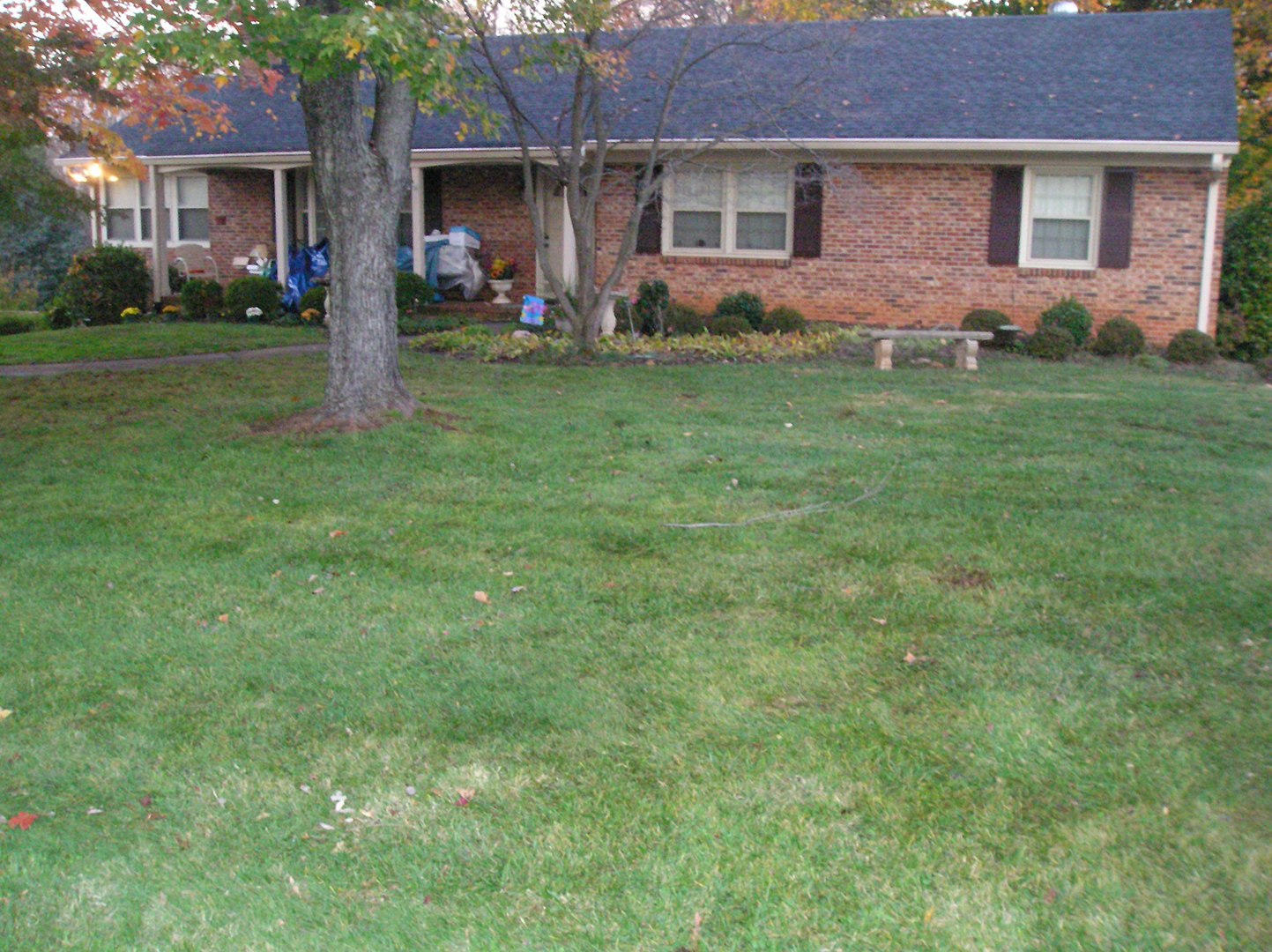 House and lawn after leaf removal by ADC Lawncare